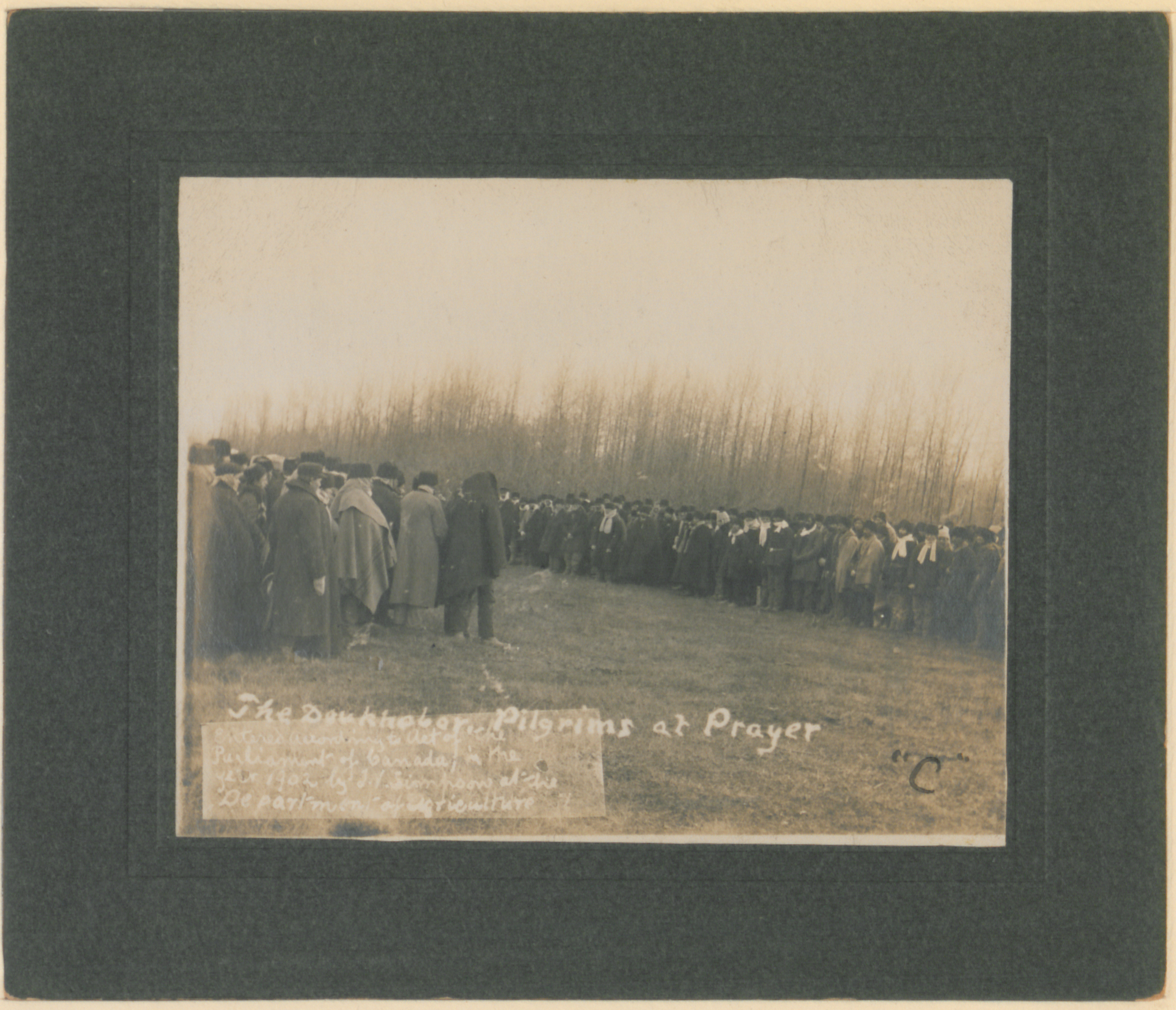 Doukhobor pilgrims at prayer on the prairie, 1902