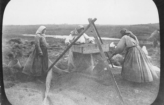 Doukhobor women winnowing grain, 1899